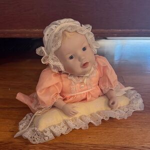 Porcelain Baby Doll in Peach Dress